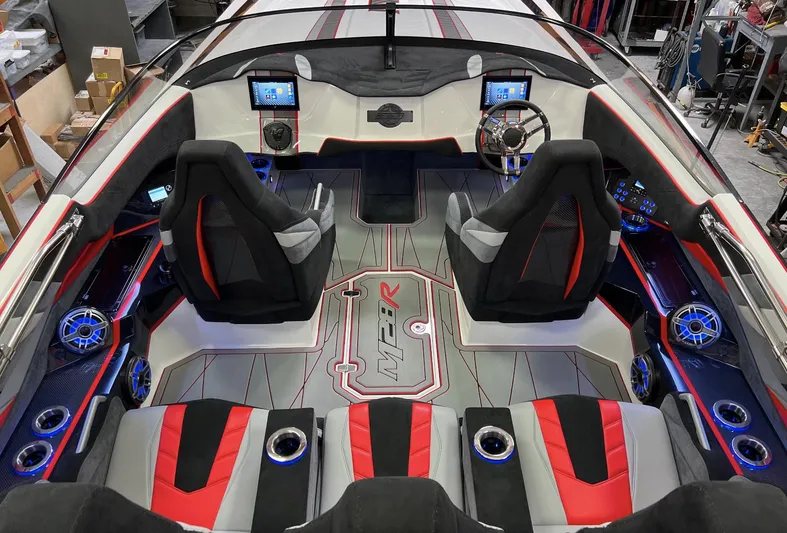  Yacht Photos Pics 2023 Daves Custom Boats M28R interior with modern dashboard and seating.