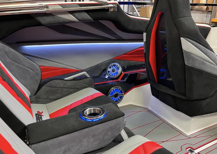  Yacht Photos Pics 2023 Daves Custom Boats M28R interior with red and gray seating, blue LED cup holders.