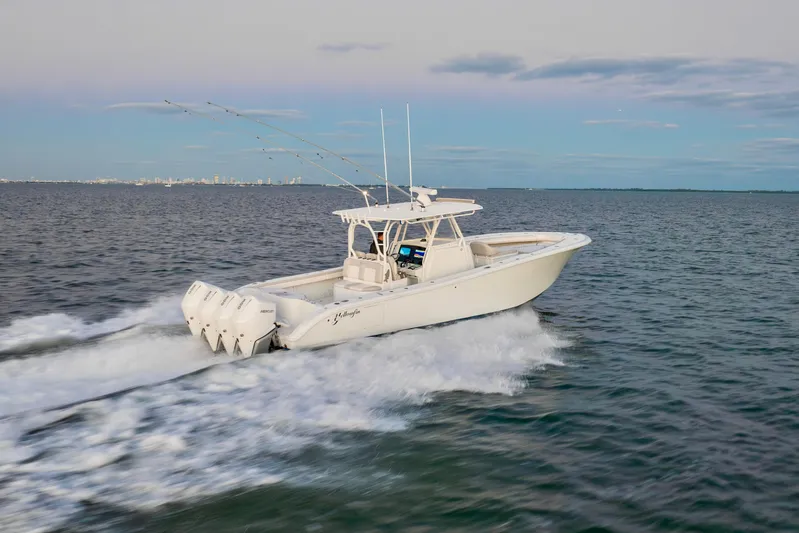  Yacht Photos Pics 2016 Yellowfin 39 Offshore boat cruising on open water.