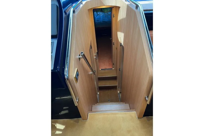  Yacht Photos Pics Staircase leading to cabin interior of 1998 Riva Dolce Vita yacht.