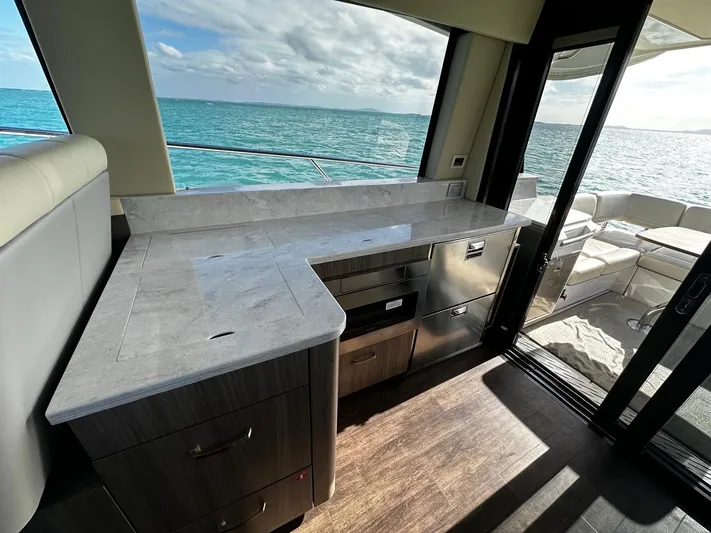  Yacht Photos Pics Luxurious interior of 2022 Regal 42 XO yacht with ocean view.