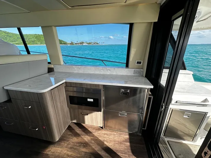  Yacht Photos Pics Luxurious interior of 2022 Regal 42 XO yacht with ocean view.