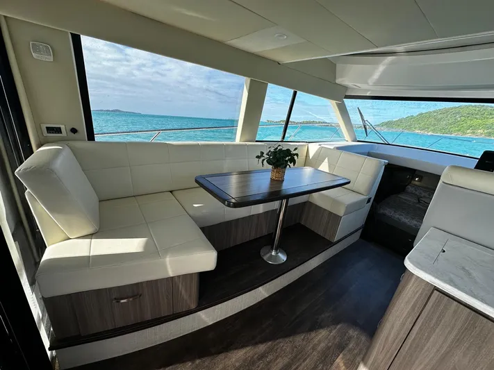  Yacht Photos Pics Luxurious interior of 2022 Regal 42 XO yacht with ocean view.