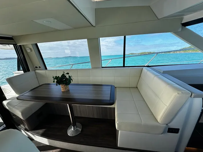  Yacht Photos Pics Luxurious interior of 2022 Regal 42 XO yacht with ocean view.