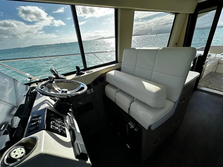  Yacht Photos Pics Interior of 2022 Regal 42 XO yacht with ocean view through windows.