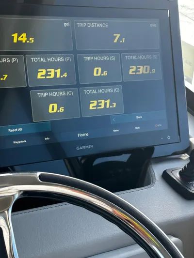  Yacht Photos Pics Garmin display on 2022 Regal 42 XO boat showing trip data and engine hours.