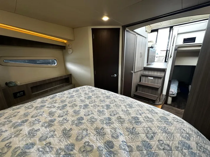  Yacht Photos Pics 2022 Regal 42 XO yacht interior with cozy bedroom and modern design.