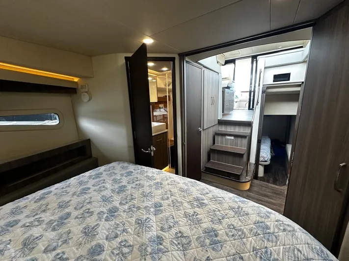  Yacht Photos Pics Interior of 2022 Regal 42 XO yacht with cozy bedroom and modern design.