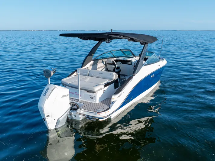  Yacht Photos Pics 2023 Sea Ray SLX 260 Outboard boat on calm water, featuring sleek design and modern amenities.