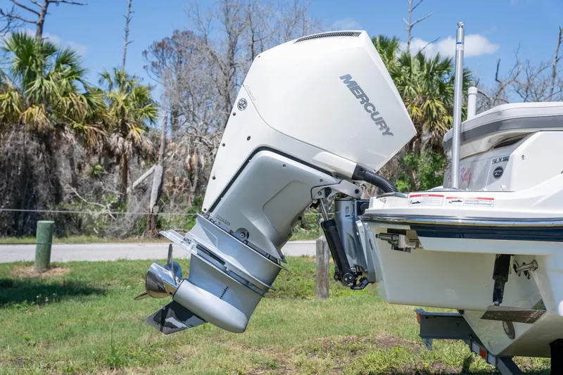  Yacht Photos Pics 2023 Sea Ray SLX 260 Outboard with Mercury engine, parked on grass.