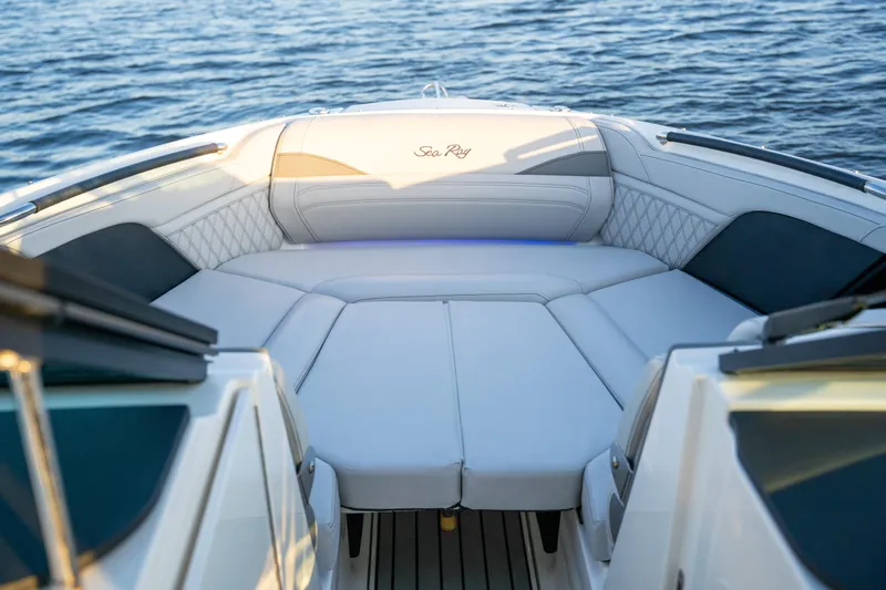  Yacht Photos Pics 2023 Sea Ray SLX 260 Outboard boat interior with luxurious seating on water.
