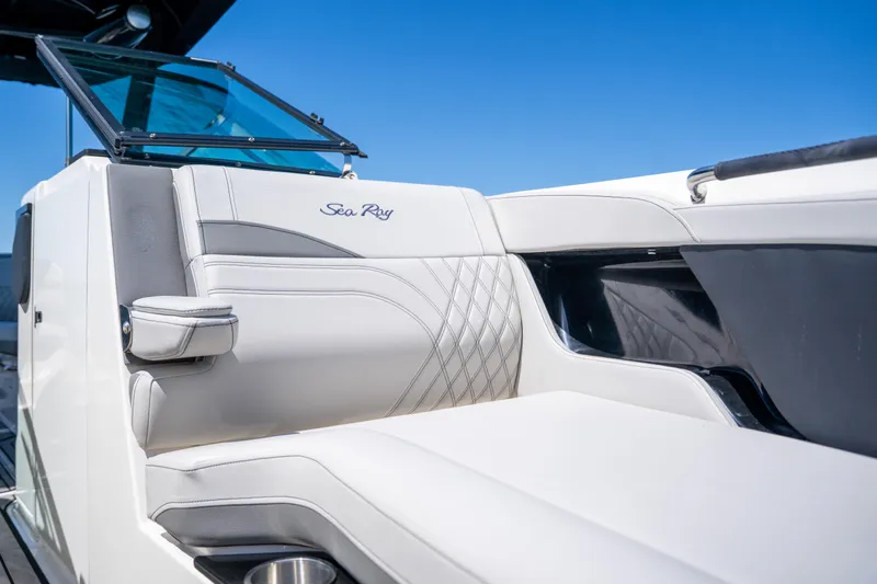  Yacht Photos Pics 2023 Sea Ray SLX 260 Outboard boat interior with luxurious seating and sleek design.