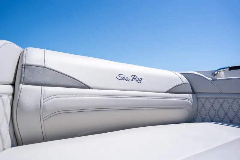  Yacht Photos Pics 2023 Sea Ray SLX 260 Outboard boat interior with elegant white seating.