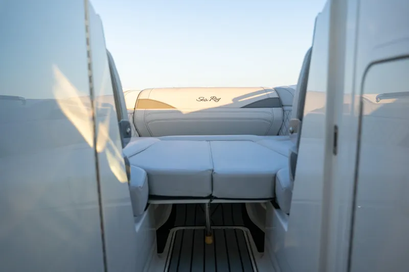  Yacht Photos Pics 2023 Sea Ray SLX 260 Outboard interior with cushioned seating and sleek design.