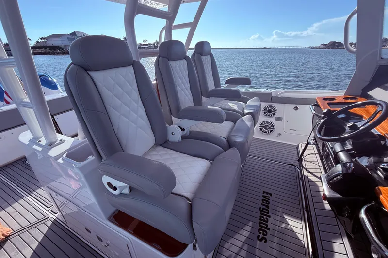  Yacht Photos Pics Luxurious seating on 2023 Everglades 395 Center Console boat, with ocean view.