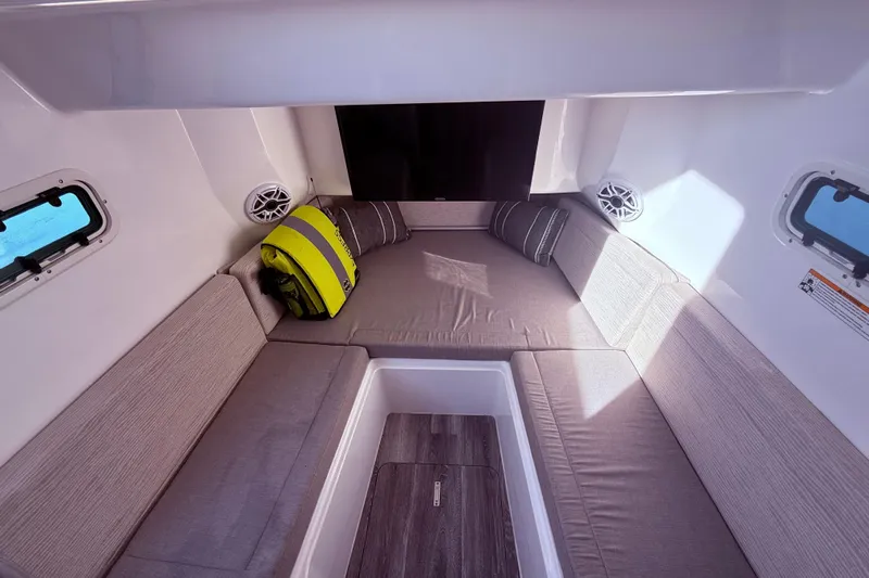  Yacht Photos Pics Interior cabin of 2023 Everglades 395 Center Console with seating and life jacket.