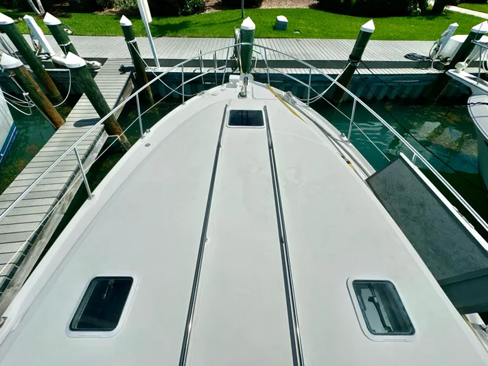 Seaswing Yacht Photos Pics Top view of a 2002 Sea Ray 380 Sundancer docked at a marina.