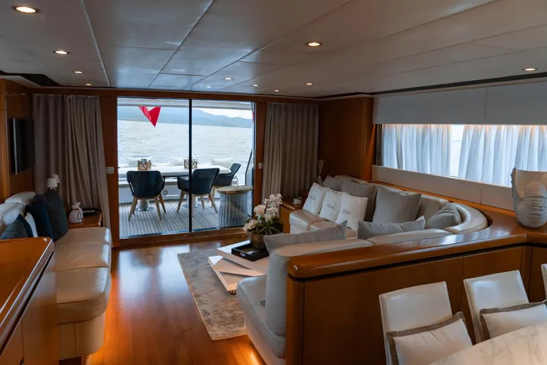  Yacht Photos Pics Luxurious interior of 2005 Diano 24 yacht with elegant seating and ocean view.