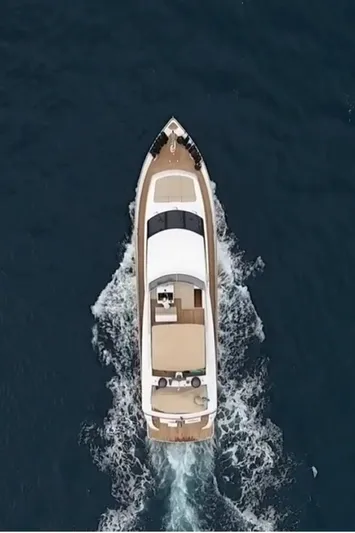  Yacht Photos Pics Aerial view of 2005 Diano 24 yacht cruising on open water.