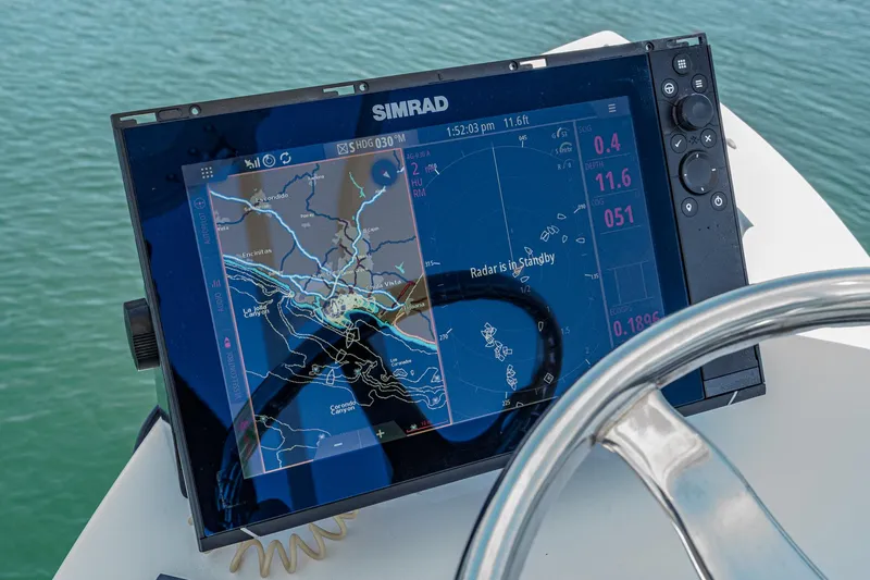 Go Time Yacht Photos Pics Simrad navigation display on 2019 Fountain 38 CC boat, showing radar and map.