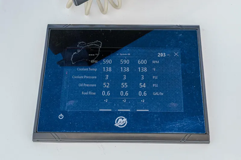 Go Time Yacht Photos Pics Digital display panel on a 2019 Fountain 38 CC boat showing engine metrics.