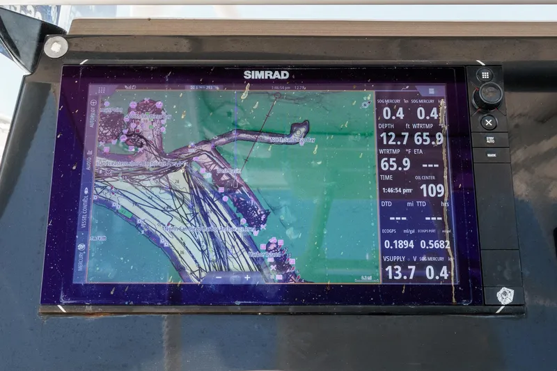 Go Time Yacht Photos Pics Simrad navigation display on 2019 Fountain 38 CC boat, showing detailed marine map and data.