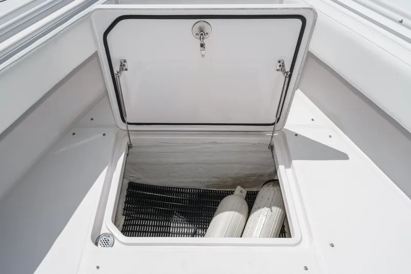 Go Time Yacht Photos Pics Open storage compartment on 2019 Fountain 38 CC boat deck.