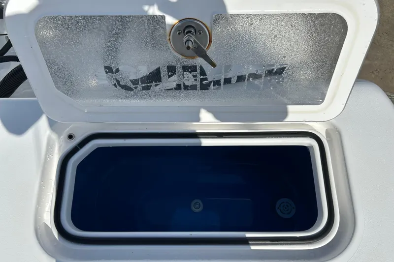  Yacht Photos Pics Open livewell on 2025 Contender 35 ST boat, showcasing interior design.
