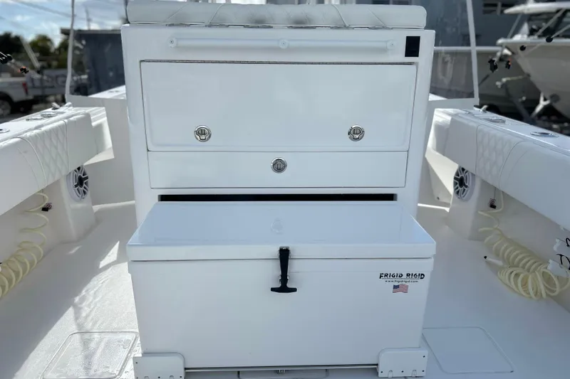  Yacht Photos Pics 2025 Contender 35 ST boat interior with storage and Frigid Rigid cooler.