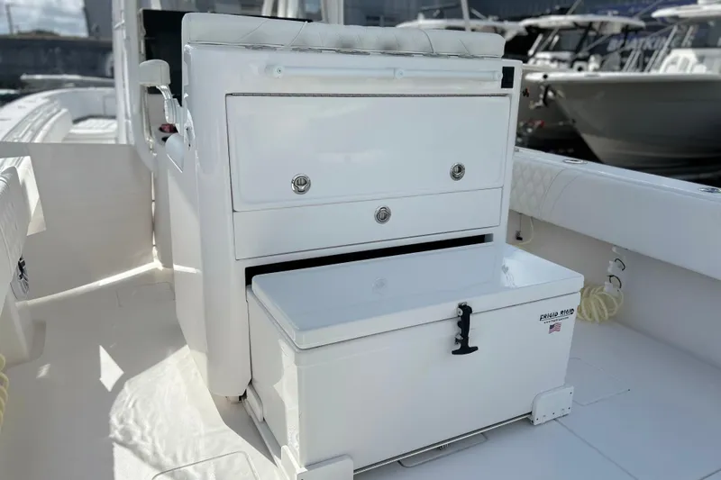  Yacht Photos Pics 2025 Contender 35 ST boat interior with storage compartments and seating.