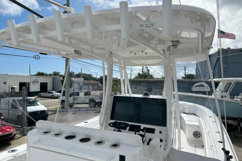  Yacht Photos Pics 2025 Contender 35 ST boat cockpit with advanced navigation system and rod holders.