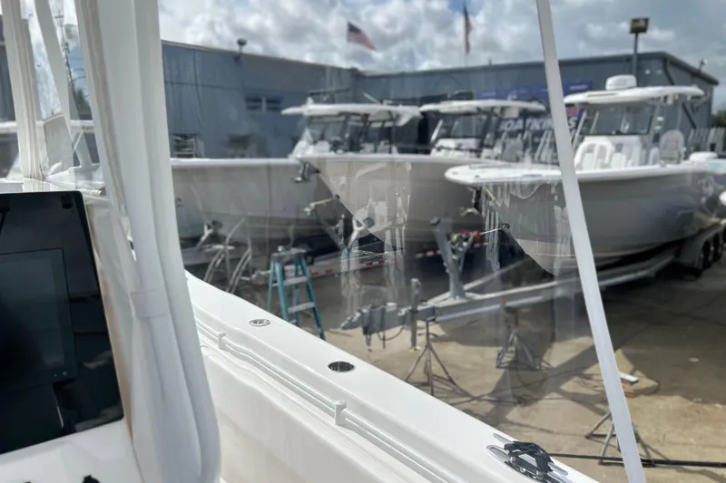  Yacht Photos Pics 2025 Contender 35 ST boats displayed at a dealership, showcasing sleek design and modern features.