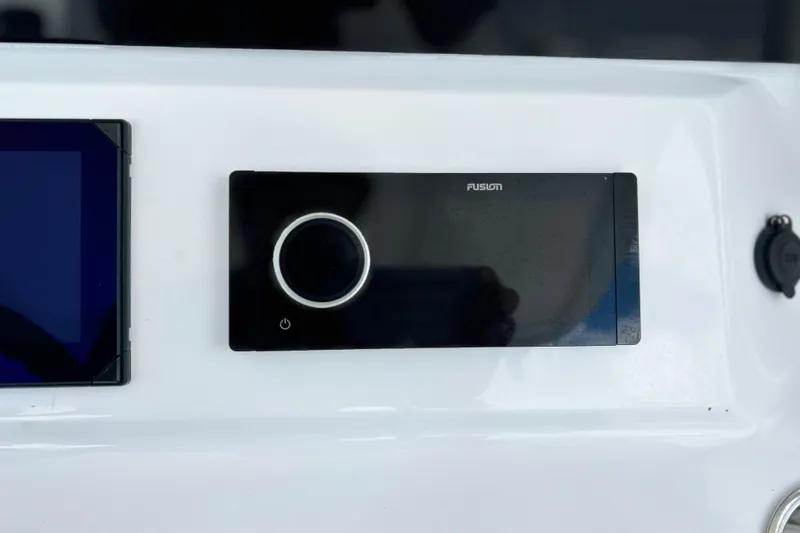  Yacht Photos Pics Control panel of 2025 Contender 35 ST boat featuring Fusion audio system.