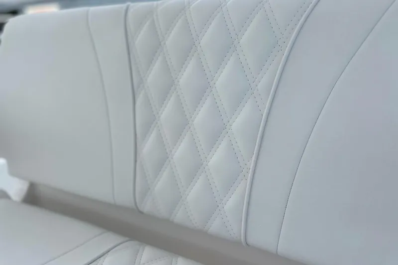  Yacht Photos Pics Luxurious white leather seating with diamond stitching in 2025 Contender 35 ST boat.