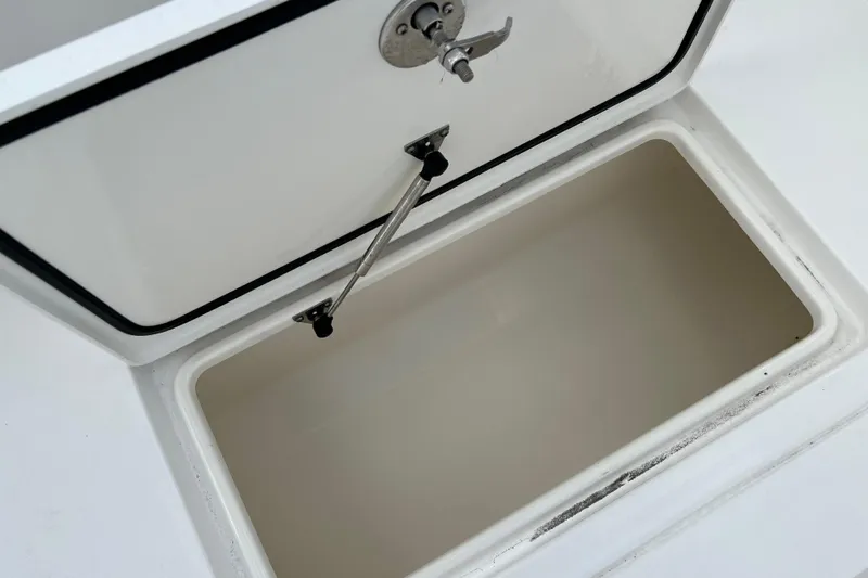  Yacht Photos Pics Open storage compartment on a 2025 Contender 35 ST boat.