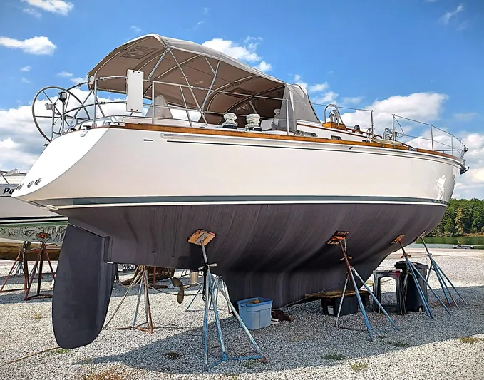 Alice Yacht Photos Pics 1983 Little Harbor 44 sailboat on stands, ready for maintenance under a clear blue sky.
