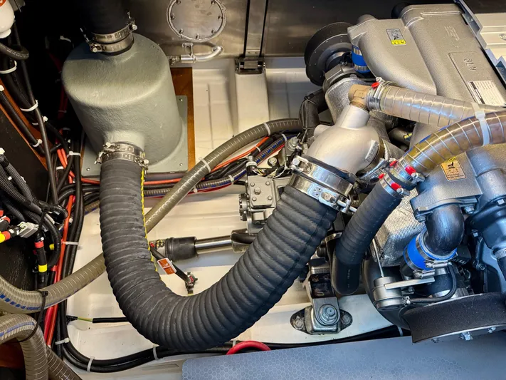 Freedom Yacht Photos Pics Engine compartment of 2022 Beneteau Swift Trawler 41 Fly, showcasing detailed mechanical components.