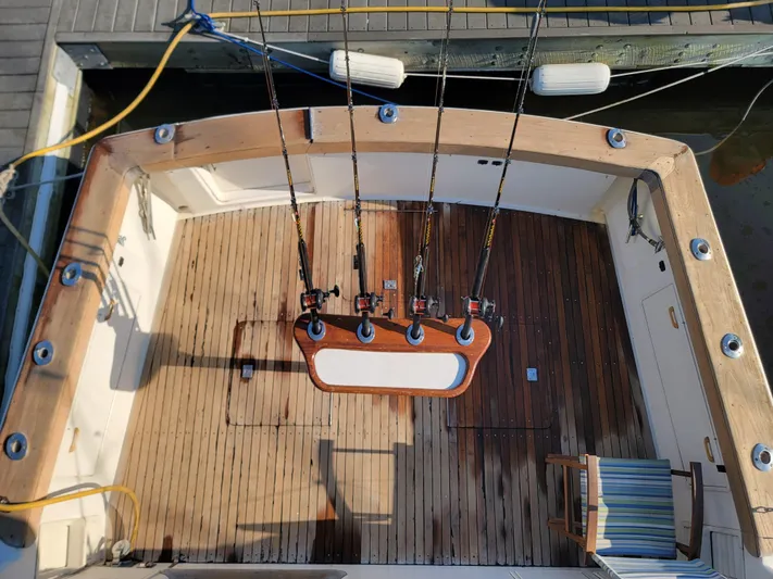  Yacht Photos Pics 1991 Ocean Yachts 42 Super Sport fishing deck with rod holders and wooden flooring.