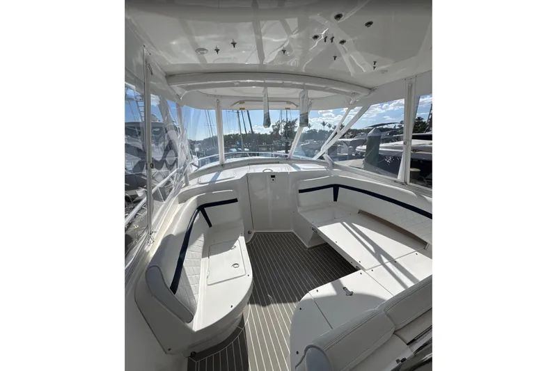  Yacht Photos Pics 2015 Intrepid 400 Cuddy boat interior with spacious seating and sleek design.