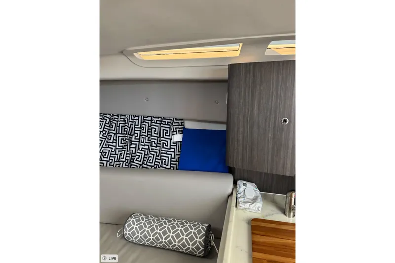  Yacht Photos Pics Interior of 2015 Intrepid 400 Cuddy with modern decor and geometric patterns.