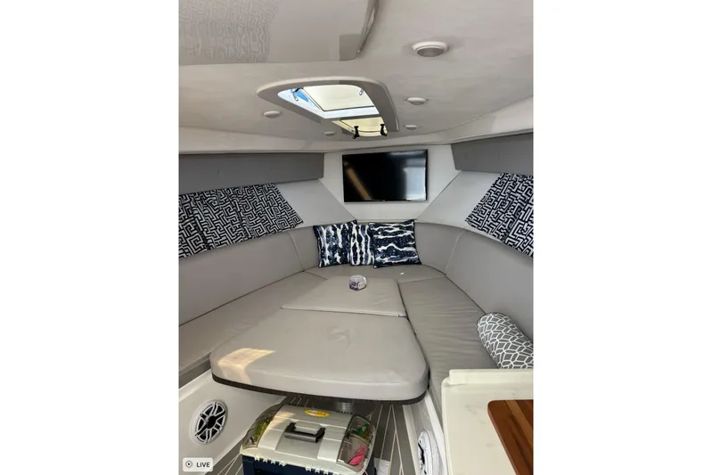  Yacht Photos Pics Luxurious interior of 2015 Intrepid 400 Cuddy with modern seating and stylish decor.