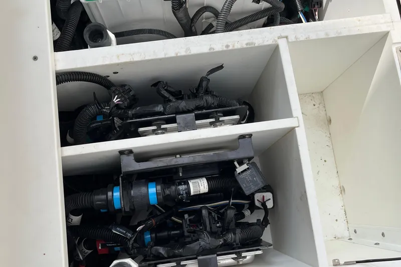  Yacht Photos Pics Storage compartment with wiring and equipment on a 2018 Boston Whaler 380 Outrage boat.