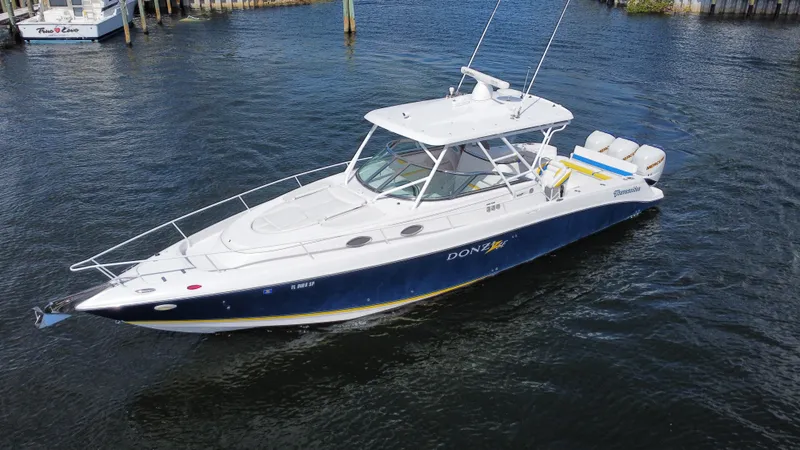 Singularity Yacht Photos Pics 2006 Donzi 38 ZSF boat on water, featuring sleek design and powerful engines.
