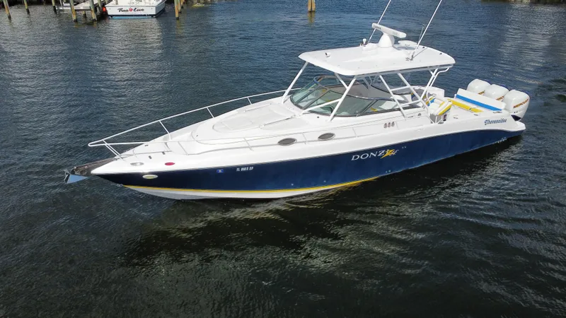 Singularity Yacht Photos Pics 2006 Donzi 38 ZSF boat on water, featuring sleek design and powerful engines.