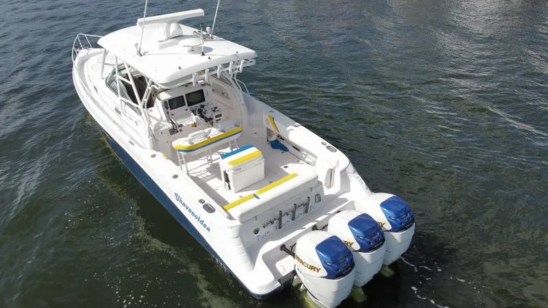 Singularity Yacht Photos Pics 2006 Donzi 38 ZSF boat with triple Mercury engines on water.