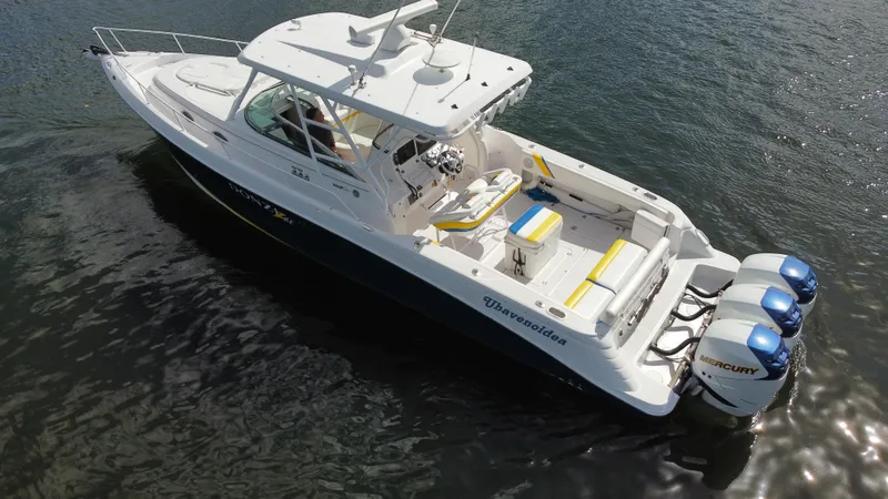 Singularity Yacht Photos Pics 2006 Donzi 38 ZSF boat with triple Mercury engines on calm water.