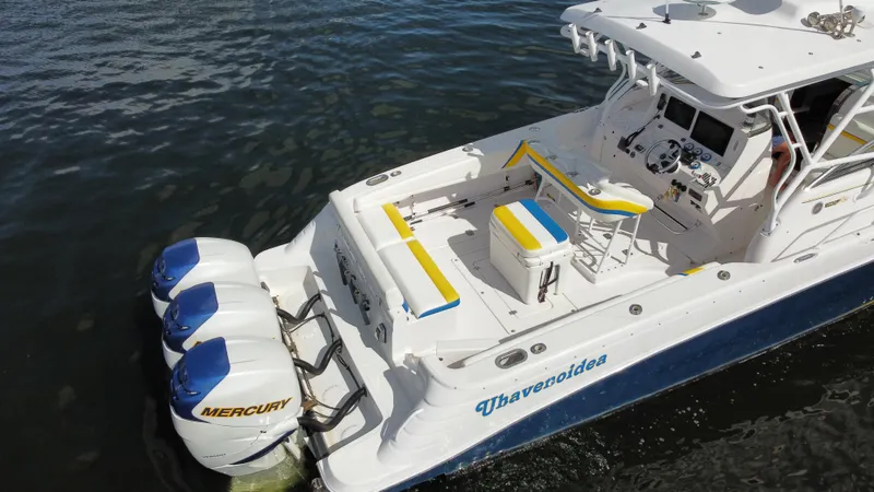 Singularity Yacht Photos Pics 2006 Donzi 38 ZSF boat with triple Mercury engines on water.