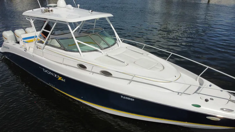 Singularity Yacht Photos Pics 2006 Donzi 38 ZSF boat on water, featuring sleek design and spacious deck.