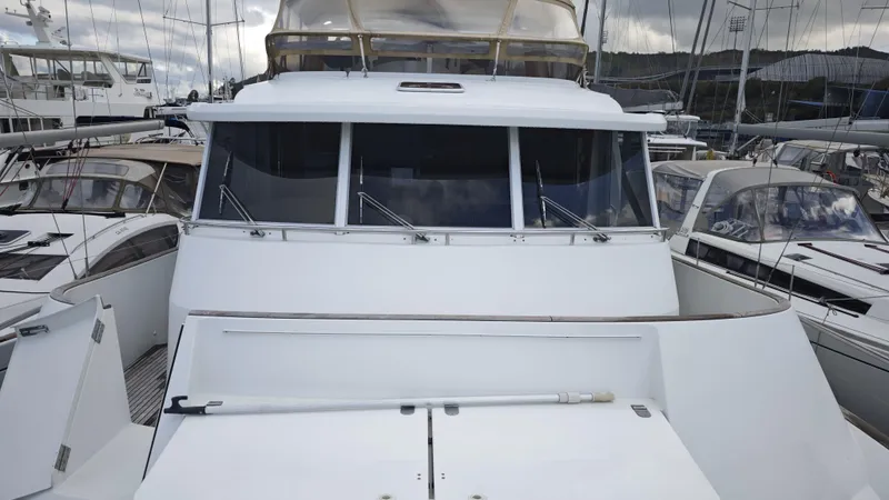 Beneteau Swift Trawler 52 Yacht Photos Pics 2011 Beneteau Swift Trawler 52 docked at marina, front view.