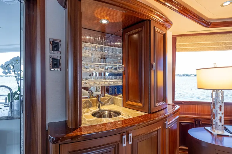 Seahawk Yacht Photos Pics Luxurious 2014 Westport Motoryacht interior with elegant wood cabinetry and built-in bar area.